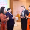 Thủ tướng Phạm Minh Chính và Phu nhân chiêu đãi Đoàn Ngoại giao nhân dịp Tết cổ truyền Giáp Thìn 2024. (Ảnh: Dương Giang/TTXVN)
