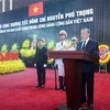 Đồng chí Tô Lâm, Ủy viên Bộ Chính trị, Chủ tịch nước, Trưởng Ban Lễ tang đọc Lời điếu. (Ảnh: TTXVN)