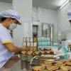 Công nhân tại một doanh nghiệp ở Khánh Hòa. (Nguồn: TTXVN)