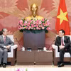 Chủ tịch Quốc hội Vương Đình Huệ tiếp Đại sứ Trung Quốc tại Việt Nam Hùng Ba. (Ảnh: Nhan Sáng/TTXVN)