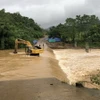 Nước sông dâng cao tại cầu tràn thôn Trăng tà Puồng, xã Hướng Lập, huyện Hướng Hóa, tỉnh Quảng Trị. (Ảnh: TTXVN phát)