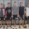 Các đối tượng tại cơ quan Công an. (Ảnh: TTXVN phát)
