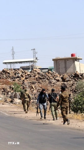 Các tay súng bộ tộc Bedouin tại thị trấn Wolgha, Sweida, Syria. (Ảnh: THX/TTXVN)