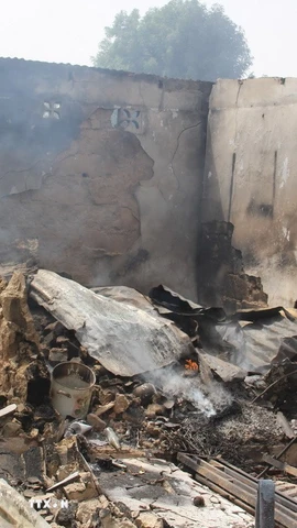 Hiện trường một vụ tấn công tại Auno, Nigeria. (Ảnh: AFP/TTXVN)