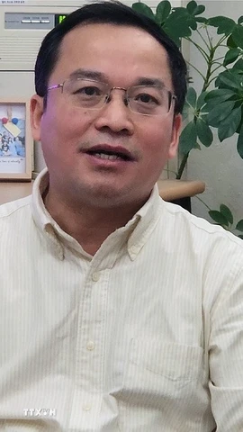 Giáo sư Thái Đức Kiên, Khoa Xây dựng và Môi trường đánh giá quyết tâm triển khai tinh gọn bộ máy của Đảng và Nhà nước ta là một thành công lớn. (Ảnh: Trường Giang/TTXVN)