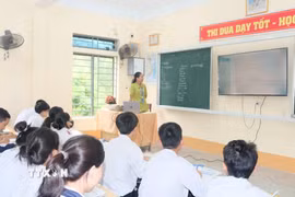 Việc dạy thêm, học thêm được quản lý chặt chẽ sẽ nêu cao trách nhiệm của giáo viên và đảm bảo quyền lợi cho học sinh. (Ảnh: Bích Huệ/TTXVN)
