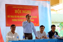 Ông Nguyễn Tiến Thành, Chủ tịch UBND phường Quảng Phúc, phường Quảng Phúc, thị xã Ba Đồn, tỉnh Quảng Bình, phát biểu tại buổi đối thoại. (Ảnh: Tá Chuyên/TTXVN)