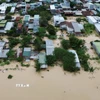 Mưa lũ gây ngập lụt sâu trên diện rộng ở Khánh Hòa. Ảnh: Nguyễn Thành - TTXVN