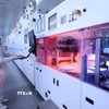 Vận hành dây chuyền sản xuất pin năng lượng mặt trời tại Công ty Trách nhiệm hữu hạn Toyo Solar, khu công nghiệp Cẩm Khê, huyện Cẩm Khê. (Ảnh: Tuấn Anh/TTXVN) 