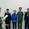 Đối tượng Thạch Kim Thái tại cơ quan công an. (Ảnh: TTXVN phát)