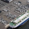 Xe ôtô chờ xuất khẩu tại trung tâm logistics ở Kawasaki, gần Tokyo, ngày 27/3/2025. (Ảnh: Kyodo/TTXVN)