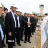 Lãnh đạo Tỉnh ủy Quảng Bình và đoàn công tác của Tổng Công ty Cảng Hàng không Việt Nam khảo sát thực tế triển khai dự án “Xây dựng Nhà ga hành khách T2 và mở rộng sân đỗ máy bay-Cảng hàng không Đồng Hới (Quảng Bình). (Ảnh: Tá Chuyên/TTXVN)
