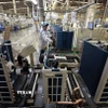 Lắp ráp điều hoà tại nhà máy của Tập đoàn Daikin Việt Nam, khu công nghiệp Thăng Long II, tỉnh Hưng Yên. (Ảnh Vũ Sinh/TTXVN)