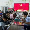 Trung tâm hành chính công xã Quảng Trực vận hành thông suốt, đảm bảo công việc thông suốt, không gián đoạn. (Ảnh: TTXVN phát)