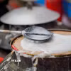 Gạo phải được chọn kỹ, ngâm đủ độ, xay mịn, rồi tráng bằng hơi nước trên nồi vải căng. (Ảnh: Khánh Hòa/TTXVN)