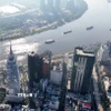 Các tòa nhà tài chính ở khu vực trung tâm Thành phố Hồ Chí Minh bên sông Sài Gòn, đối diện bán đảo Thủ Thiêm, phường An Khánh. (Ảnh: Hồng Đạt/TTXVN)