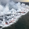 Trong ảnh (tư liệu): Dung nham phun trào từ miệng núi lửa Kilauea trên đảo lớn nhất thuộc quần đảo Hawaii, Mỹ, ngày 26/6/2018. (Ảnh: AFP/TTXVN)