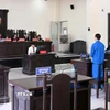 Quang cảnh buổi xét xử. (Ảnh: TTXVN phát)