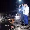 Phó Chủ tịch Ủy ban Nhân dân tỉnh Quảng Ninh Nghiêm Xuân Cường có mặt tại hiện trường chỉ đạo công tác tìm kiếm. (Ảnh: TTXVN phát) 