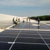 Các doanh nghiệp gia tăng đầu tư điện năng lượng tái tạo, phục vụ cho các nhà máy sản xuất. (Ảnh: TTXVN phát)