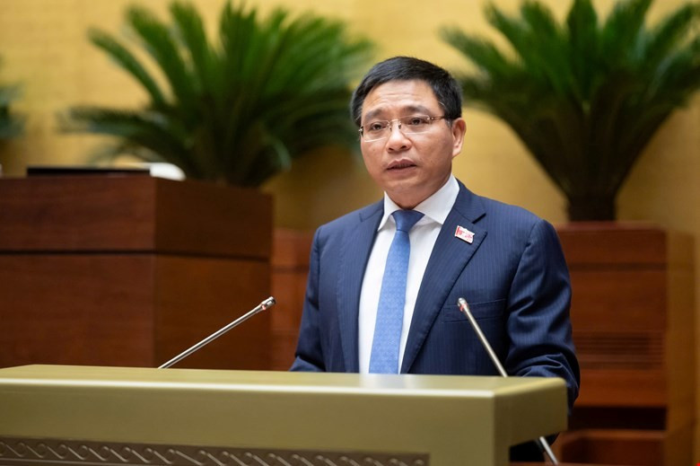 Bộ trưởng Bộ Tài chính Nguyễn Văn Thắng, thừa ủy quyền của Thủ tướng Chính phủ trình bày tờ trình dự án Luật sửa đổi, bổ sung một số điều của Luật Doanh nghiệp. (Ảnh: QH/Vietnam+)