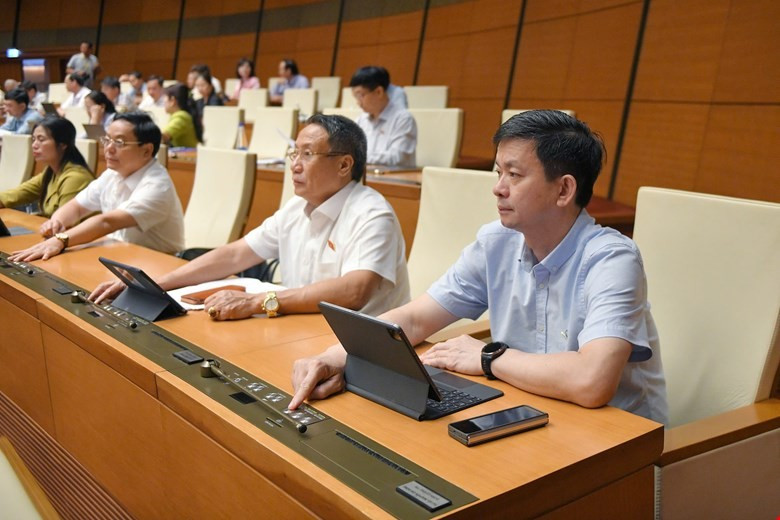 Ngày 14/6, Quốc hội đã chính thức thông qua Luật Thuế thu nhập doanh nghiệp (sửa đổi) với 94,56% phiếu thuận. (Ảnh: CTV/Vietnam+)