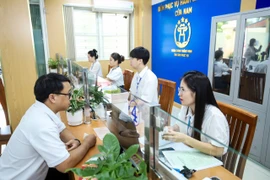 Nhiều địa phương của Hà Nội “số hóa từng quy trình, cá thể hóa từng người dân." (Ảnh: Xuân Quảng/Vietnam+)