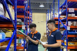 Doanh nghiệp nhỏ và vừa chiếm 98,2% tổng số doanh nghiệp, sử dụng 55,1% lực lượng lao động và đóng góp hơn 40% GRDP của Hà Nội. (Ảnh: PV/Vietnam+)