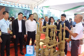 Hà Nội sẽ hỗ trợ doanh nghiệp nhỏ và vừa chuyển đổi và tăng trưởng xanh, phát triển bền vững theo các mô hình kinh tế tuần hoàn. (Ảnh: TTXVN)