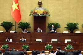 Phó Chủ tịch Quốc hội Nguyễn Khắc Định điều hành phiên họp sáng 8/5. (Ảnh: An Đăng/TTXVN)