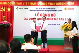 Buổi lễ công bố và trao quyết định bổ nhiệm ông Nguyễn Đình Khoát giữ chức vụ Bí thư Đảng ủy, Tổng Giám đốc Công ty Cổ phần Công nghiệp Cao su Miền Nam. (Ảnh: PV/Vietnam+)