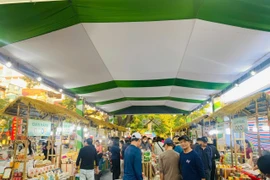 Các hoạt động xúc tiến thương mại, kết nối giao thương, kích cầu tiêu dùng và hỗ trợ các chủ thể OCOP được đẩy mạnh. (Ảnh: Vietnam+)