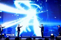 Các đại biểu thực hiện Nghi thức phát động chương trình. (Ảnh: Tuấn Anh/TTXVN)