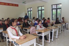 Khi mô hình trường nội trú liên cấp đi vào hoạt động, 320 học sinh của Trường THCS Yên Khương sẽ được ăn, ở, sinh hoạt ngay tại trường, dưới sự chăm lo và quản lý sát sao của thầy cô. (Ảnh: Nguyễn Nam/TTXVN)