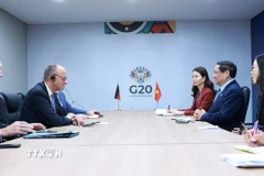 Thủ tướng Phạm Minh Chính gặp Thủ tướng Đức Friedrich Merz. (Ảnh: Dương Giang/TTXVN)