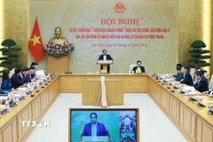 Thủ tướng Phạm Minh Chính chủ trì Hội nghị sơ kết triển khai “Chiến dịch Quang Trung” xây dựng nhà ở cho nhân dân có nhà bị thiệt hại do bão, lũ tại khu vực miền Trung. (Ảnh: Dương Giang/TTXVN)