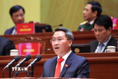 Đồng chí Nguyễn Tấn Phát, Thành ủy viên, Bí thư Đảng ủy phường Sài Gòn (Thành phố Hồ Chí Minh), trình bày tham luận “Lãnh đạo phát triển kinh tế tư nhân nhanh và bền vững”. (Ảnh: TTXVN)