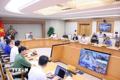 Quang cảnh cuộc họp triển khai công tác ứng phó với cơn bão số 12 (bão Fengshen) và sau mưa bão. (Ảnh: Văn Điệp/TTXVN)