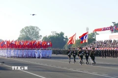 Lễ kỷ niệm 50 năm Quốc khánh Lào. (Ảnh: Xuân Tú/TTXVN)