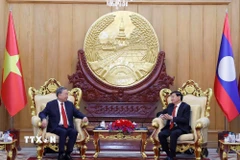 Tổng Bí thư Tô Lâm và Tổng Bí thư, Chủ tịch nước Lào Thongloun Sisoulith gặp hẹp. (Ảnh: Thống Nhất/TTXVN)