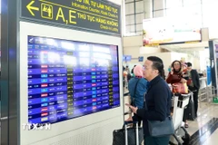 thông tư 12 đã sửa đổi quy định về tiêu chuẩn mua vé máy bay đi công tác trong nước. (Ảnh: Quốc Khánh/TTXVN)
