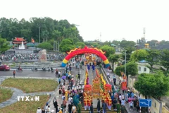 Nghi lễ khai hội đền Cửa Ông, Cẩm Phả. (Ảnh: Thanh Vân/TTXVN)