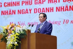 Thủ tướng Phạm Minh Chính phát biểu tại Hội nghị gặp mặt đại diện doanh nghiệp nhân Ngày doanh nhân Việt Nam. (Ảnh: Dương Giang/TTXVN)