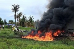 HIện trường vụ trực thăng cảnh sát rơi và bốc cháy. (Nguồn: bangkokpost)