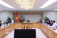 Phó Thủ tướng Trần Hồng Hà chủ trì cuộc họp về Dự án đầu tư đoạn tuyến cao tốc Sơn La-Điện Biên-Cửa khẩu Tây Trang. (Ảnh: Văn Điệp/TTXVN)