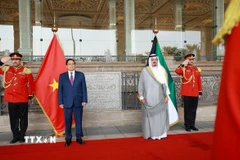 Thủ tướng Nhà nước Kuwait Sheikh Ahmad Abdullah Al-Ahmad Al Sabah đón Thủ tướng Phạm Minh Chính thăm chính thức Kuwait. (Ảnh: Dương Giang/TTXVN)