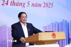Thủ tướng Phạm Minh Chính chủ trì cuộc làm việc của Thường trực Chính phủ với các bộ, ngành, chuyên gia, ngân hàng về tình hình thị trường vàng. (Ảnh: Dương Giang/TTXVN)