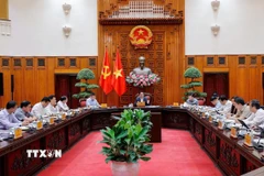 Thủ tướng Phạm Minh Chính chủ trì cuộc họp với các bộ, ngành để chuẩn bị đàm phán thương mại với phía Hoa Kỳ. (Ảnh: Dương Giang/TTXVN)