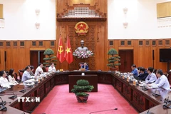 Thủ tướng Phạm Minh Chính chủ trì cuộc họp về đảm bảo cân bằng thương mại với Hoa Kỳ. (Ảnh: Dương Giang/TTXVN)