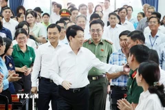 Chủ tịch nước Lương Cường dự Hội nghị tiếp xúc cử tri huyện Hóc Môn và huyện Củ Chi. (Ảnh: Lâm Khánh/TTXVN)